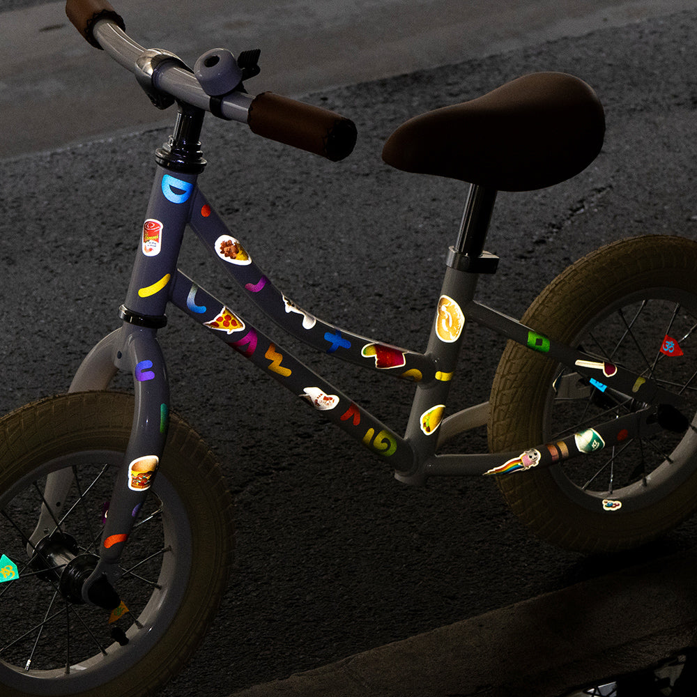 Reflective doodle design on white kids bike