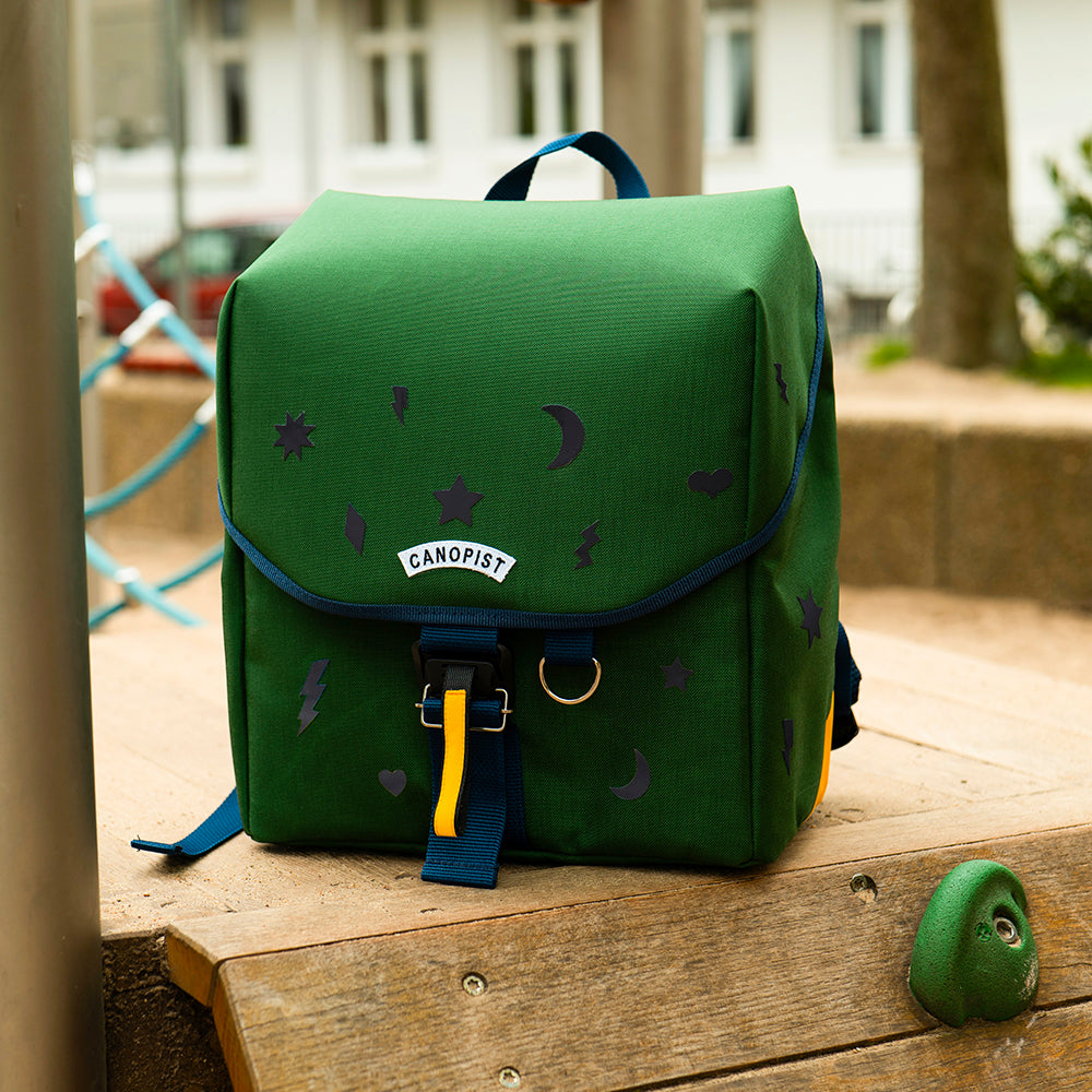 school bag at the playground, with blurry background