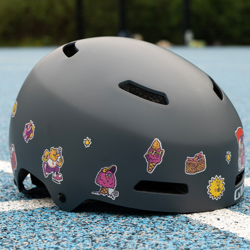 Details of reflective sticker set from C.Miller on helmet with blue floor