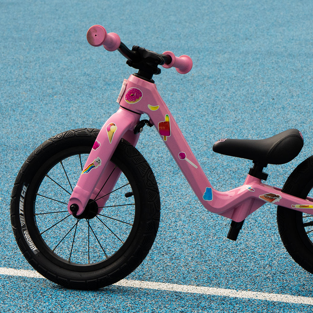 Reflective sweet set on pink bike and blue background