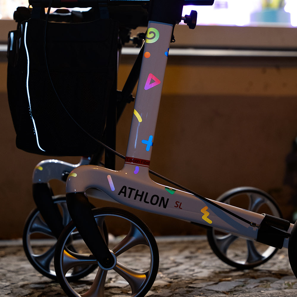 Reflective doodle design sticker applied on carbon rollator