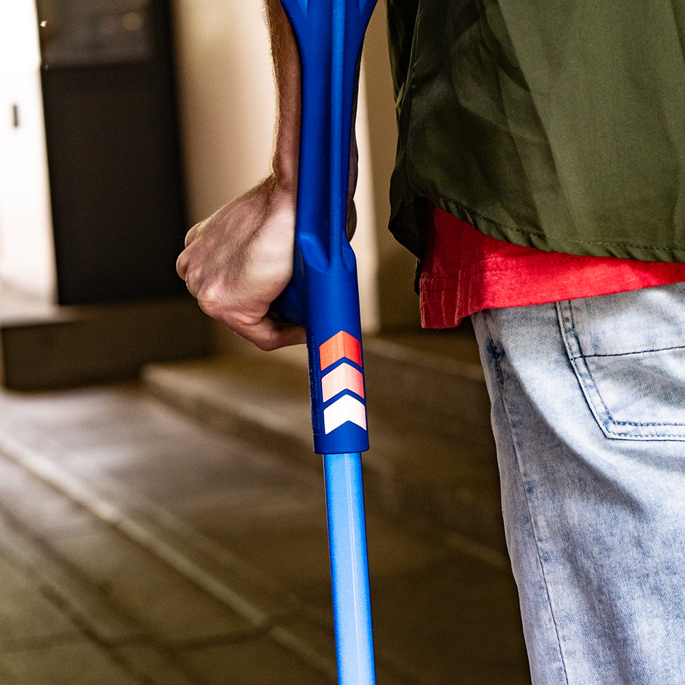 reflective stikers on back of crutches, with blurry background